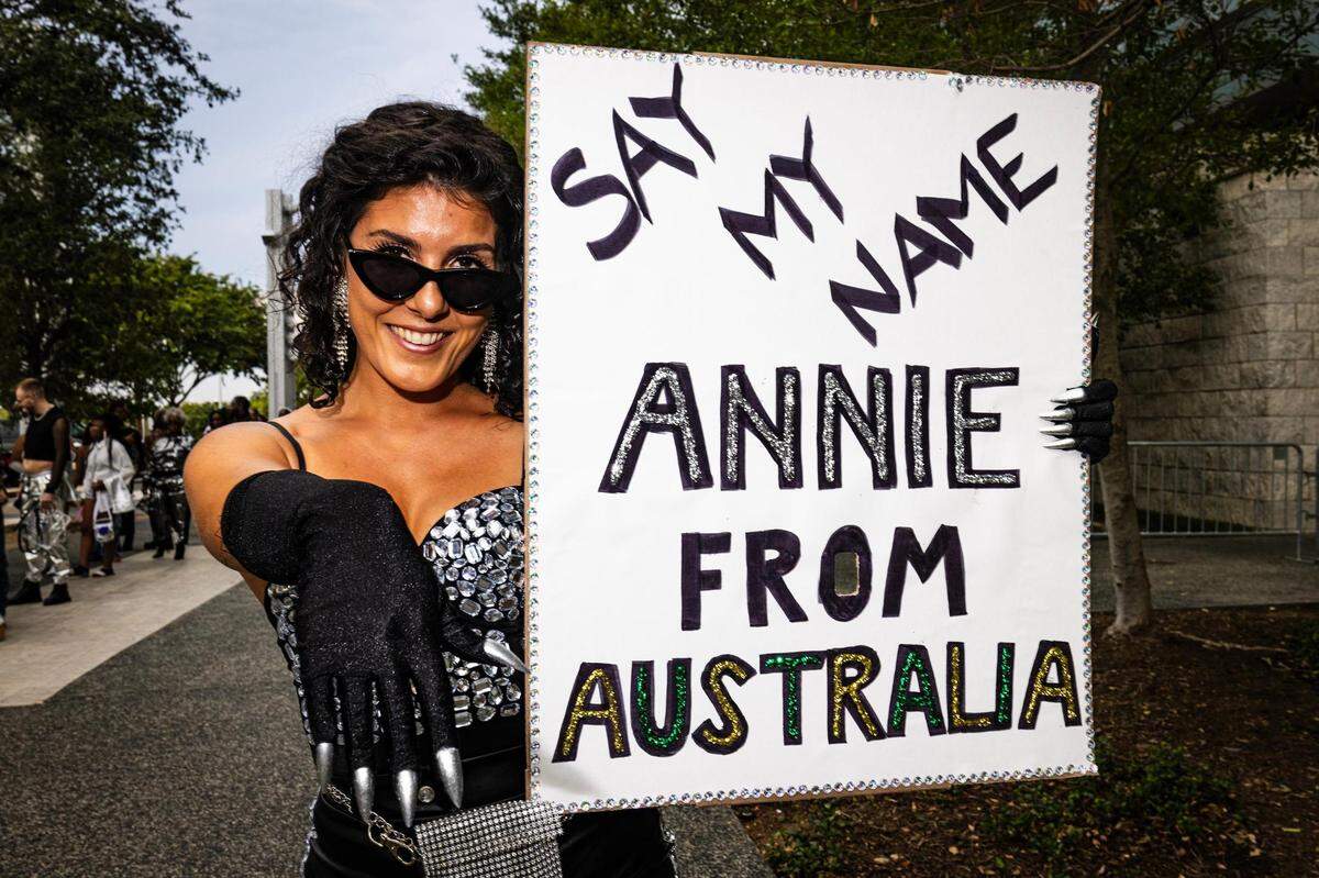 Annie Paris poses for a portrait with her sign before entering Beyonce’s Renaissance World Tour at AT&T Stadium in Arlington on Thursday, Sept. 21, 2023. Paris made the trip from Melbourne, Australia to watch Beyonce in her home state.