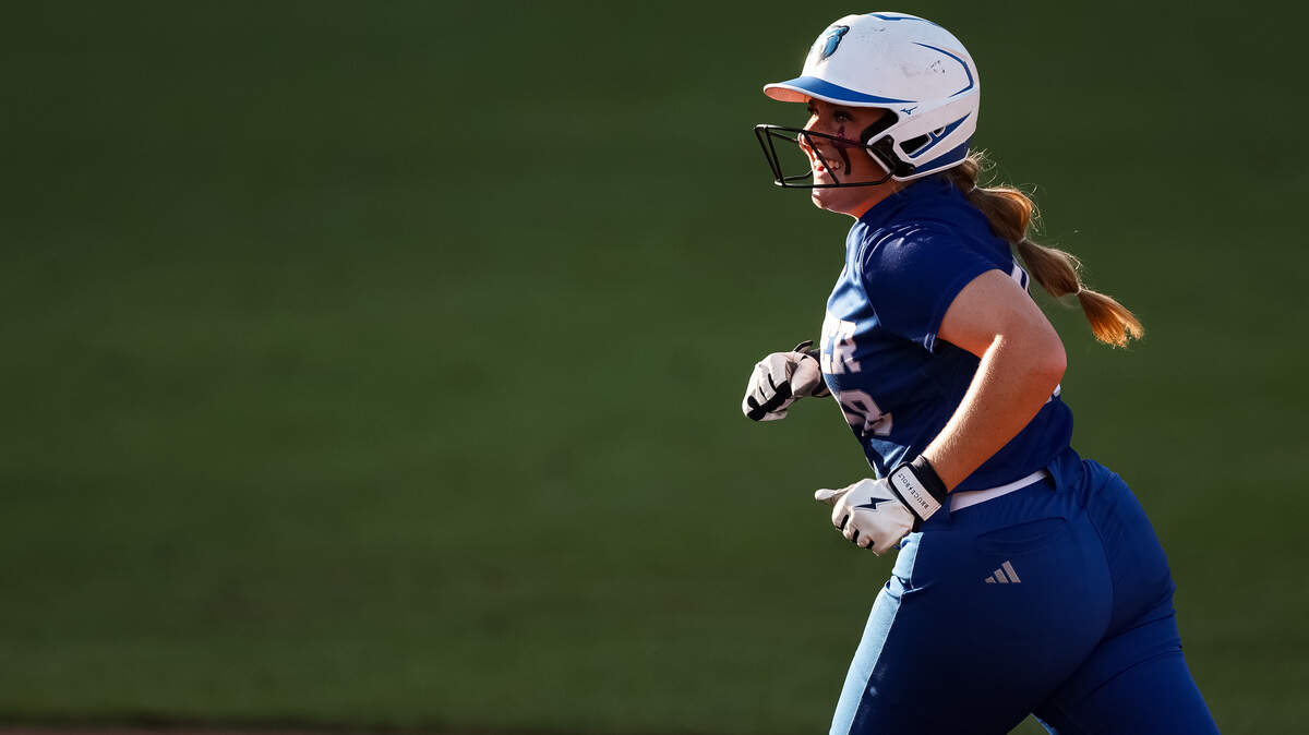 White Settlement Brewer first baseman Kamren Pride (18) smiles toward her teammates after hitting a home run against Montgomery Lake Creek in the UIL Class 5A Division II state softball championship game at Red & Charline McCombs field in Austin, Texas, on Friday, May 29, 2026.