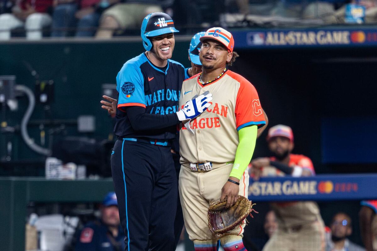 Los Angeles Dodgers first baseman Freddie Freeman and Cleveland Guardians first baseman Josh Naylor embrace at first base after Freeman stepped on Naylor’s ankle on the way to first base in the eighth inning of the 2024 MLB All Star Game at Globe Life Field in Arlington on Tuesday July 16, 2024.