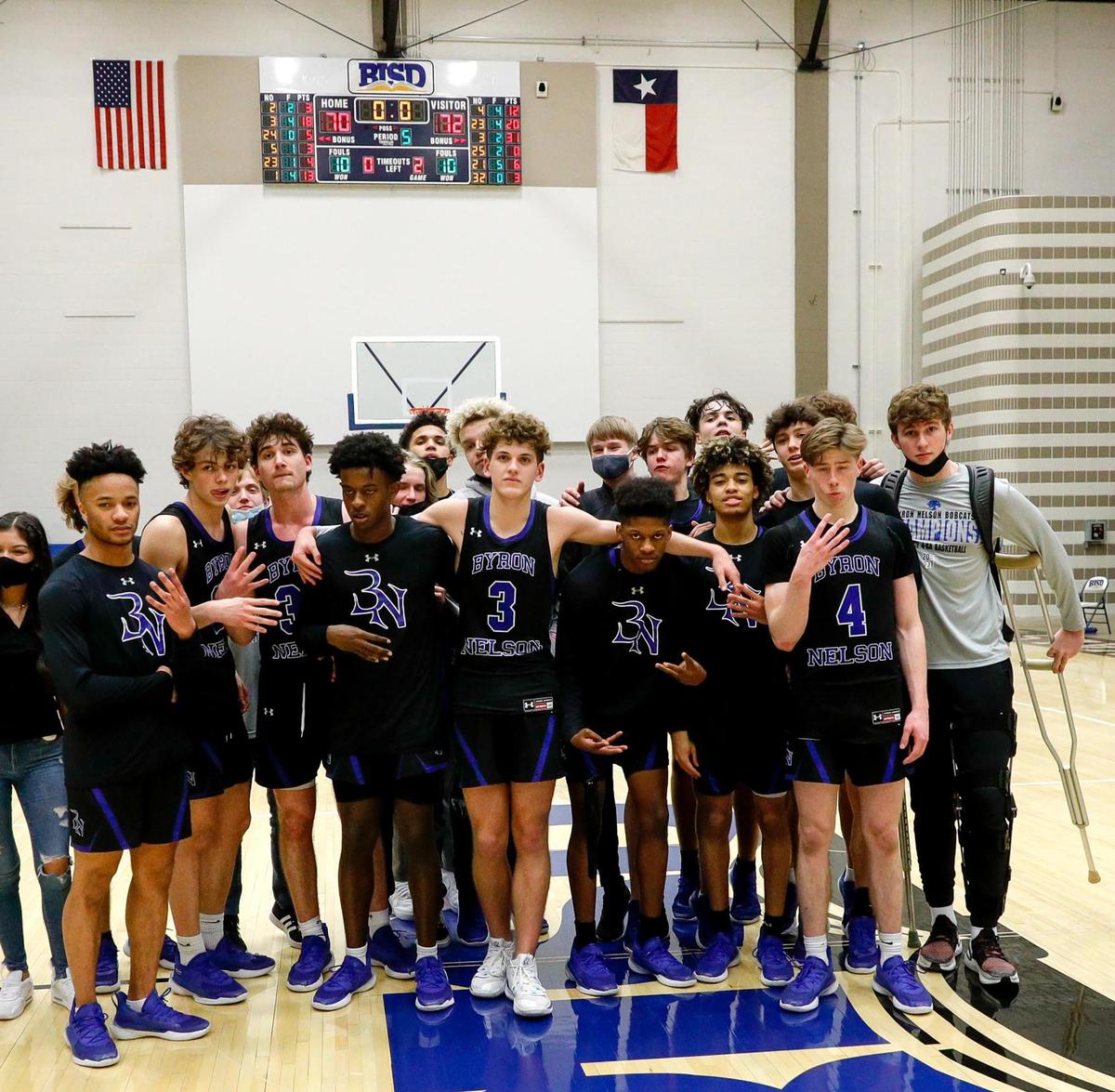 The Byron Nelson Bobcats celebrate a victory over North Crowley, 72-70 in overtime, Friday, February 26, 2021 of a 6A Region 1 Quarterfinal High School playoff Basketball game played at the Thomas Coliseum in Haltom City, Tx. (Steve Nurenberg Special to the Star-Telegram)