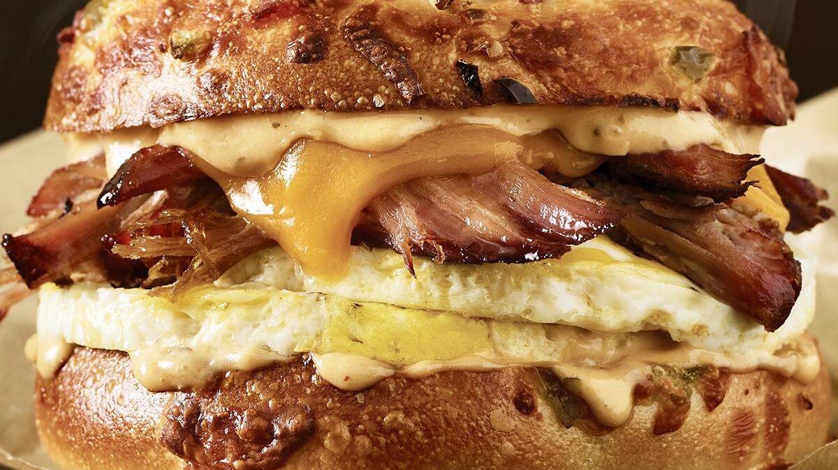 The bagel sandwich has brisket, cheddar and a chipotle sauce,