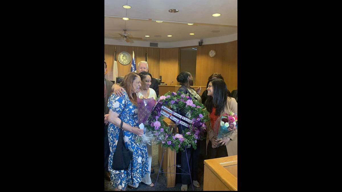 The Tarrant County District Attorney’s Office hosted Monday’s event in honor of National Crime Victims’ Rights Week. From left to right, Andrelyn Law, her daughter and Wendy Ayala spoke at the event and shared their stories of surviving abuse.