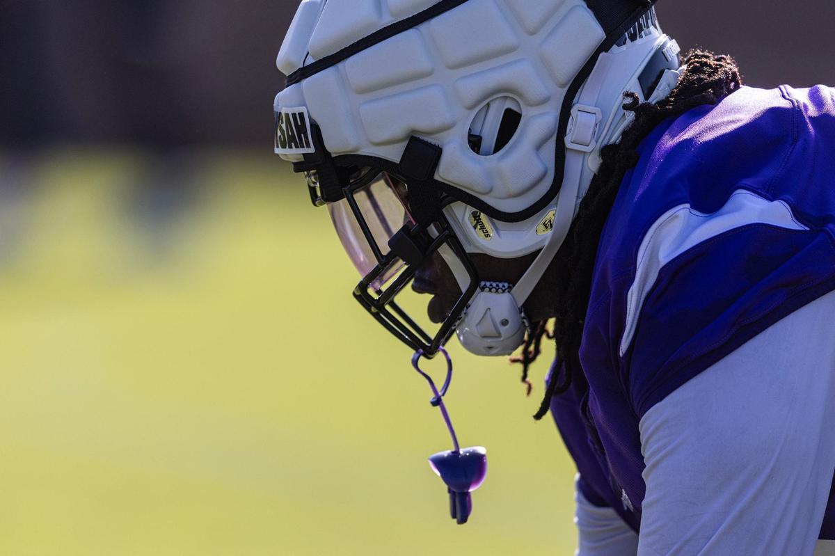 TCU defensive lineman NaNa Osafo-Mensah (54) participates in a defensive drill during the first practice of the season at the Sheridan & Cliff Morris Football Practice Fields in Fort Worth on Tuesday.