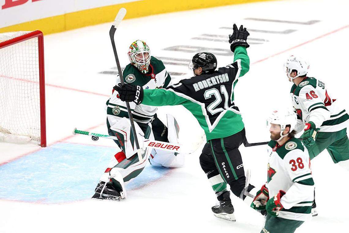 DALLAS, TEXAS - APRIL 20: Jason Robertson #21 of the Dallas Stars celebrates a goal against Jesper Wallstedt #30 of the Minnesota Wild during the third period of Game Two of the First Round of the 2026 Stanley Cup Playoffs at American Airlines Center on April 20, 2026 in Dallas, Texas. (Photo by Stacy Revere/Getty Images)
