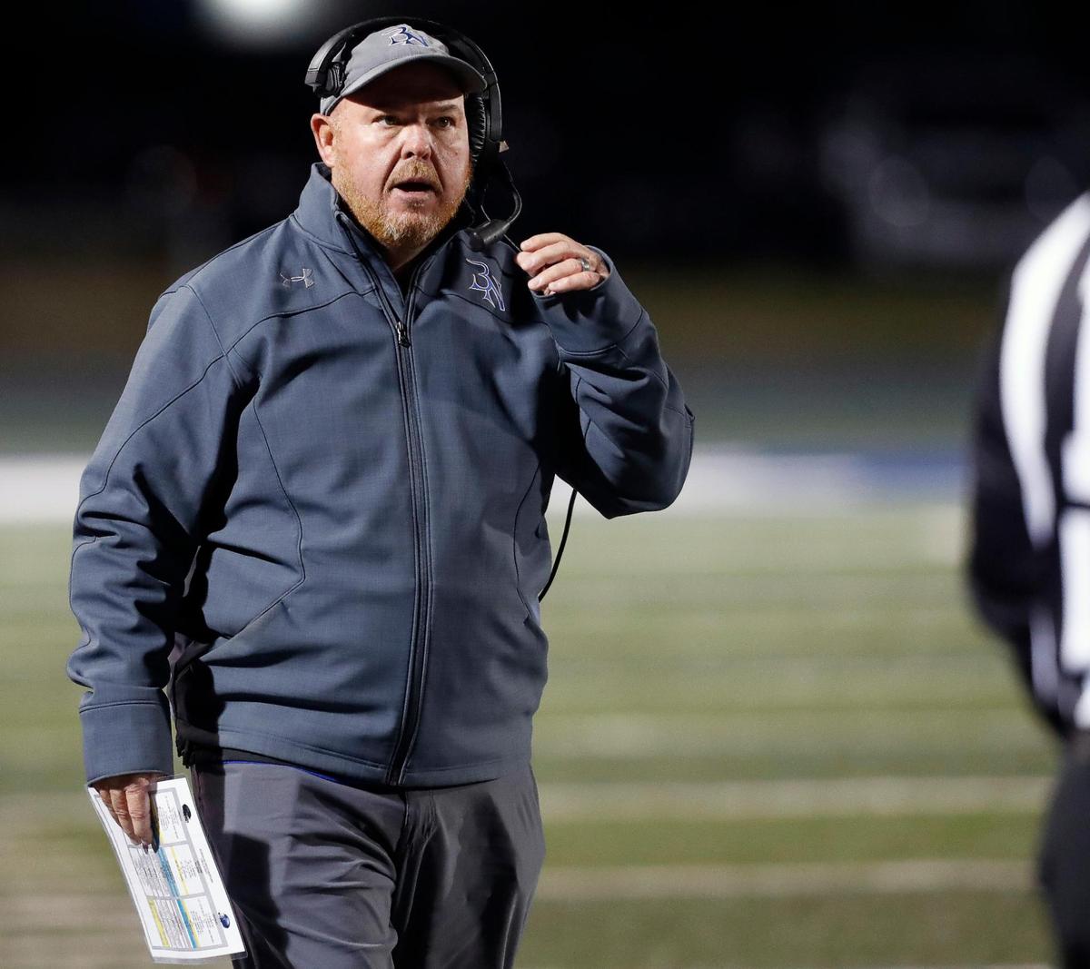 Byron Nelson head coach Travis Pride glances down the sidelines in a 6A Division 2 bi-district football playoff game at Kangaroo Stadium in Weatherford, Texas, Friday Nov. 12, 2021. Byron Nelson moves on to the next round defeating Weatherford 35-14. (Special to the Star-Telegram Bob Booth)