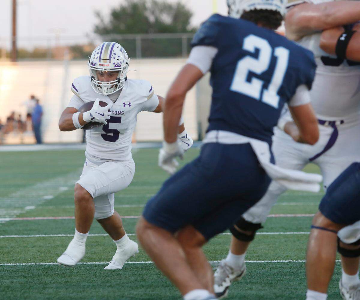Timber Creek’s Tony Hoagland finds a hole in the L.D. Bell defense to score a touchdown during their UIL football game Friday night at Pennington Field In Hurst on Friday Sept. 6, 2024.
