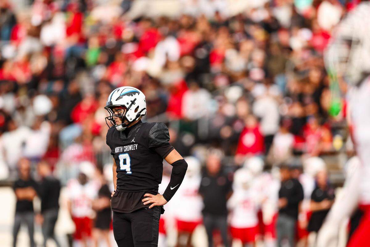 North Crowley quarterback Hayes Cloutier stares toward his sideline while driving against Coppell in a Class 6A Division I regional playoff Saturday.