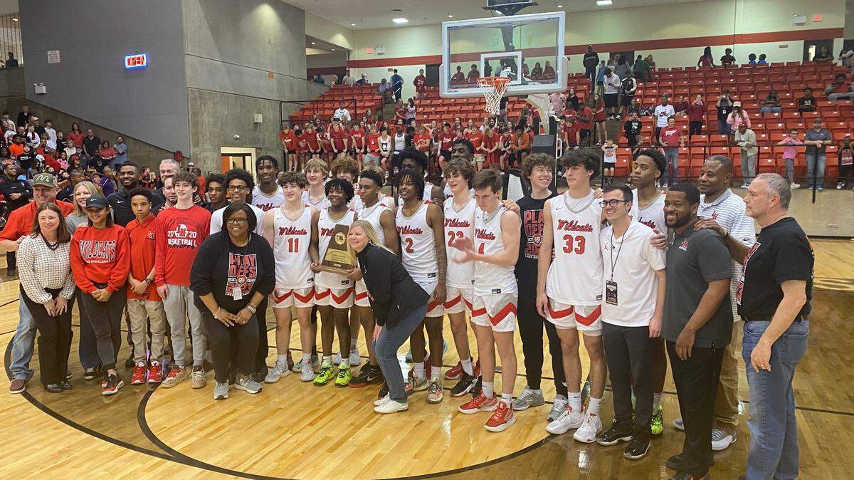 Lake Highlands posing with the championship trophy after defeating Byron Nelson 62-36