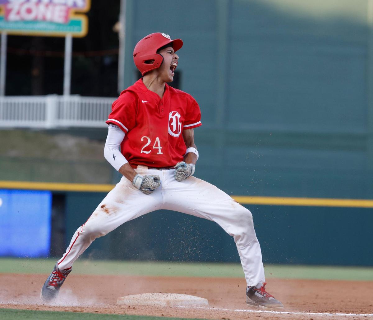Grapevine catcher Gianni Corral (24) celebrates Knocking in two runs and reaching third during a UIL 5A D2 semifinal baseball game at Riders Park in Frisco, Texas, Friday, May 30, 2025.