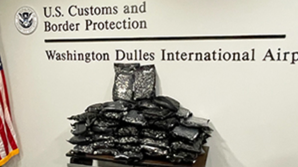A North Texas women planning to take $330,000 worth of marijuana to London was arrested at Washington Dulles International Airport, authorities say.