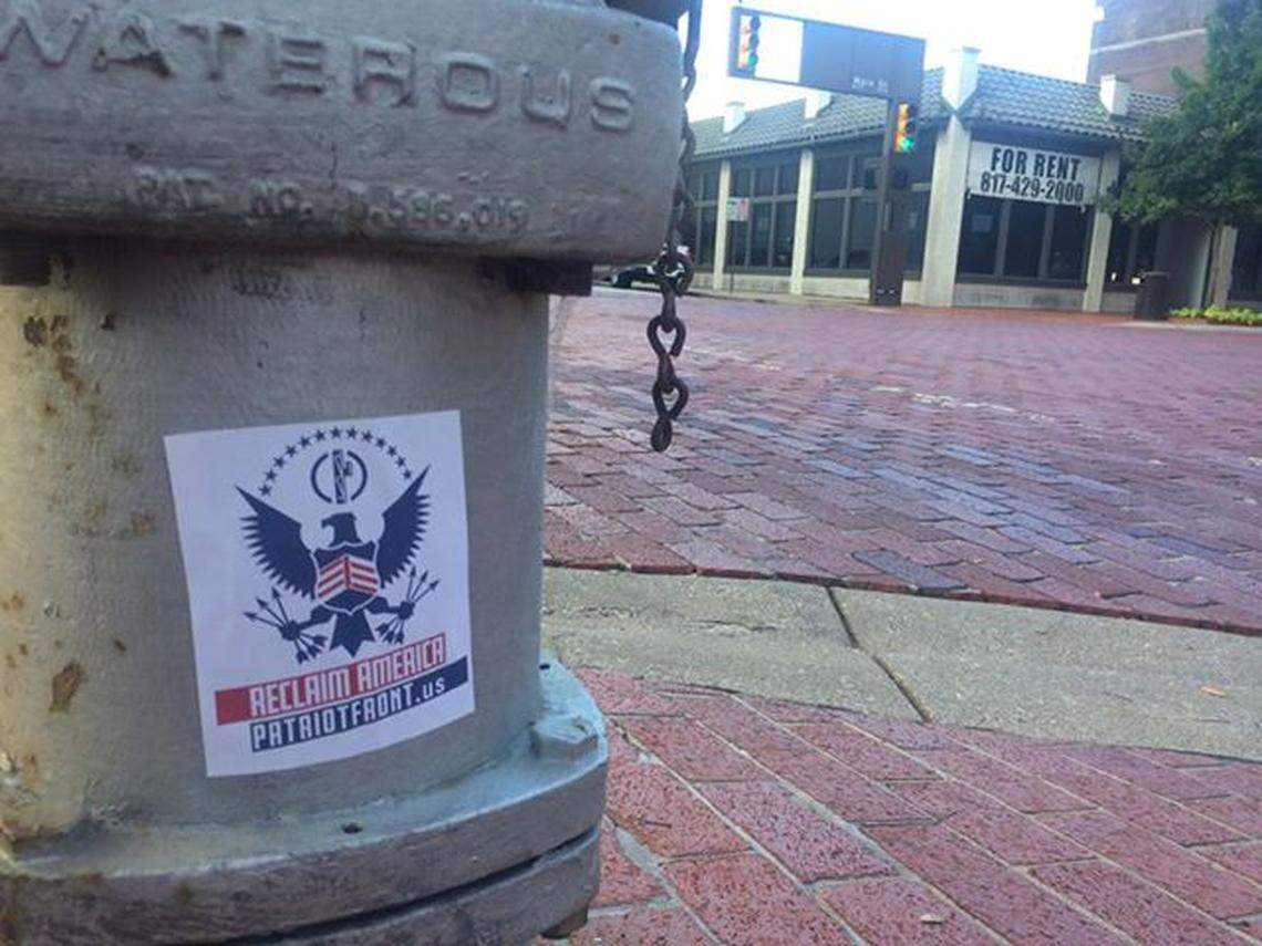 A fire hydrant at the corner of Main Street and W. 1st Street was plastered with a Patriot Front sticker in 2018.