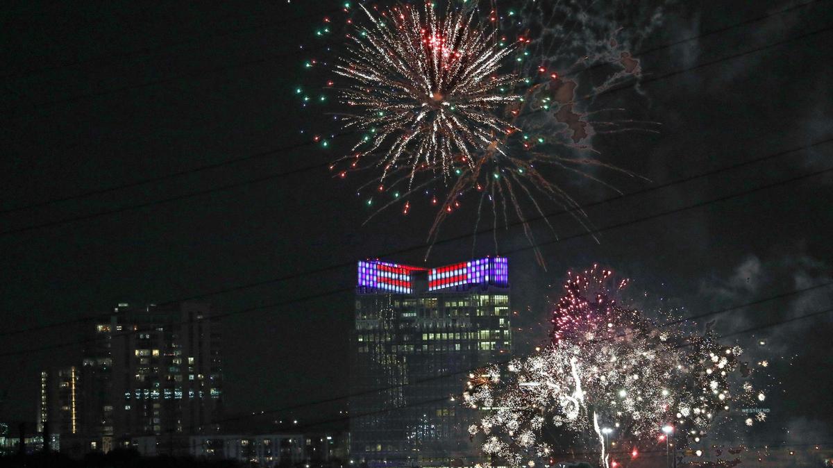 Fireworks light the night sky during the beginning moments of the Fourth of July fireworks display in Fort Worth, Texas, Monday, July 4, 2022.