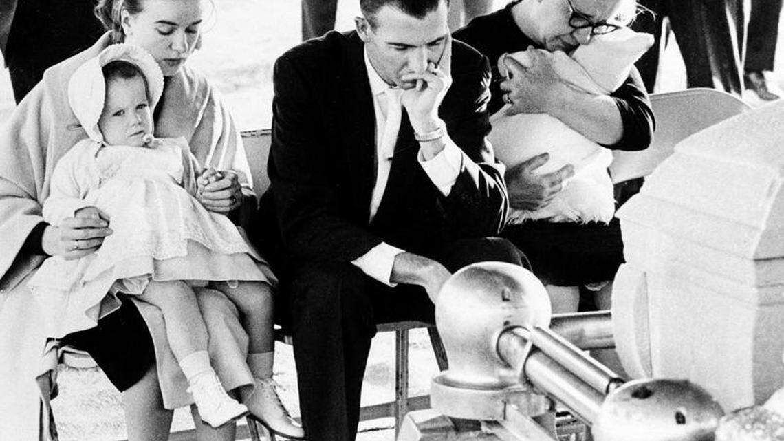 Robert Oswald, center, grieves with other members of Lee Harvey Oswald's family  at a funeral service in Fort Worth on Nov. 25, 1963. From left are Oswald's wife, Marina, holding their daughter June Lee, 22 months; Robert, his brother; and their mother, Marguerite Oswald, holding her 5-week-old grandchild Rachel.