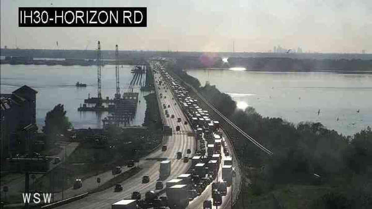 The westbound lanes on Interstate 30 near the bridge over Lake Ray Hubbard were closed Wednesday evening from Horizon Road to Dalrock Road in Rowlett due to a drug investigation and police chase that ended in a shooting, according to authorities. The suspect died after an exchange of gunfire.