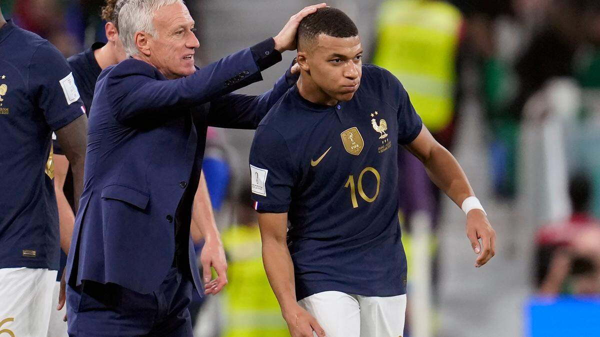France’s head coach Didier Deschamps, left, celebrates a goal by France’s Kylian Mbappe, right, during the World Cup round of 16 soccer match between France and Poland, at the Al Thumama Stadium in Doha, Qatar, Sunday, Dec. 4, 2022.