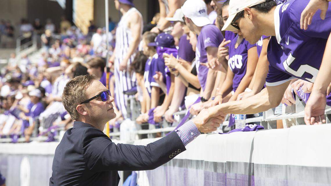 TCU athletic director Jeremiah Donati visits the student section before a football game. (Photo courtesy TCU)