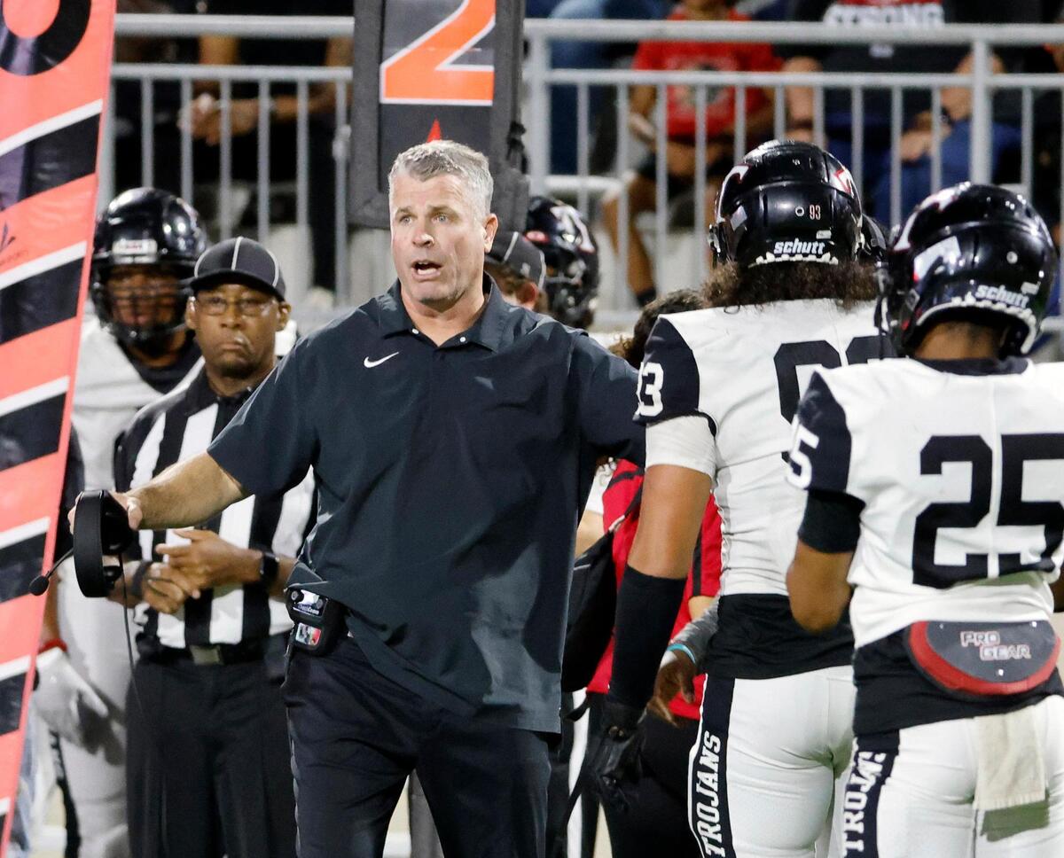 Trinity head coach Aaron Lineweaver puts defensive lineman Michael Tilmon (93) in the game in the first half of a UIL high school football game at Crowley ISD Multi-Purpose Stadium in Crowley, Texas, Friday, Oct. 20, 2023.
