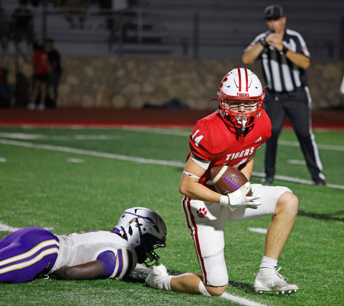 Glen Rose defensive back Kaiden Shannon (14) grabs an interception during a UIL football game at Tiger Stadium in Glen Rose Texas, Friday, Sept. 27, 2024.