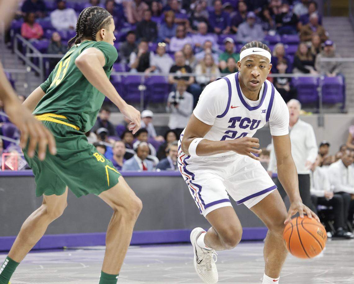 TCU forward Xavier Edmonds (24) brings the ball into the key in front of Baylor guard Cameron Carr (43) during the first half of a NCAA basketball game between Baylor University and TCU at Schollmaier Arena in Fort Worth, Texas, Saturday Jan. 03, 2026