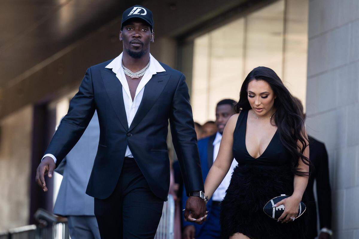 Dallas Cowboys defensive end DeMarcus Lawrence walks the blue carpet for the season kickoff event Thursday, Aug. 25, 2022, at Ford Center in Frisco.