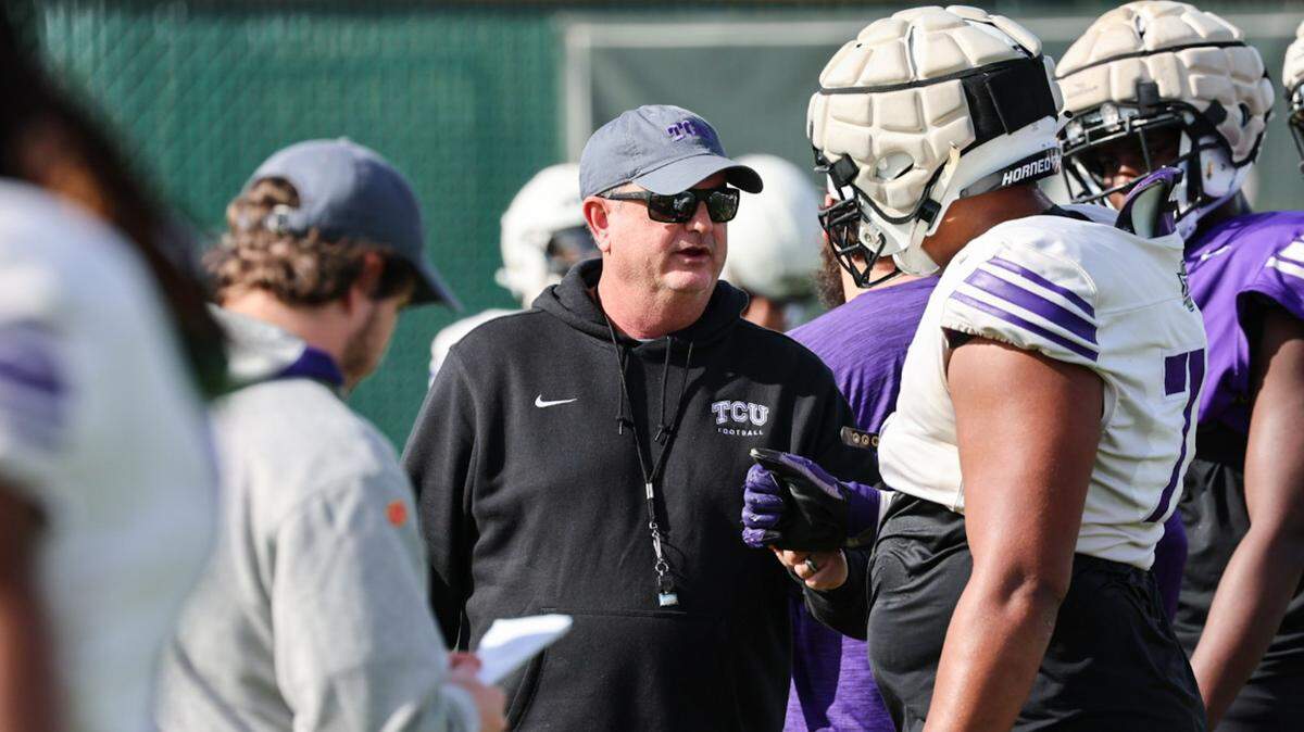 TCU coach Sonny Dykes observes practice for the Fiesta Bowl at Notre Dame Prep in Scottsdale, Ariz., on Tuesday.