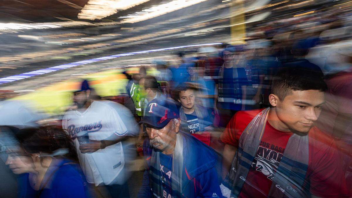 Fans begin to enter the stadium prior to game 1 of the World Series between the Texas Rangers and the Arizona Diamondbacks at Globe Life Field in Arlington on Friday, Oct. 27, 2023.