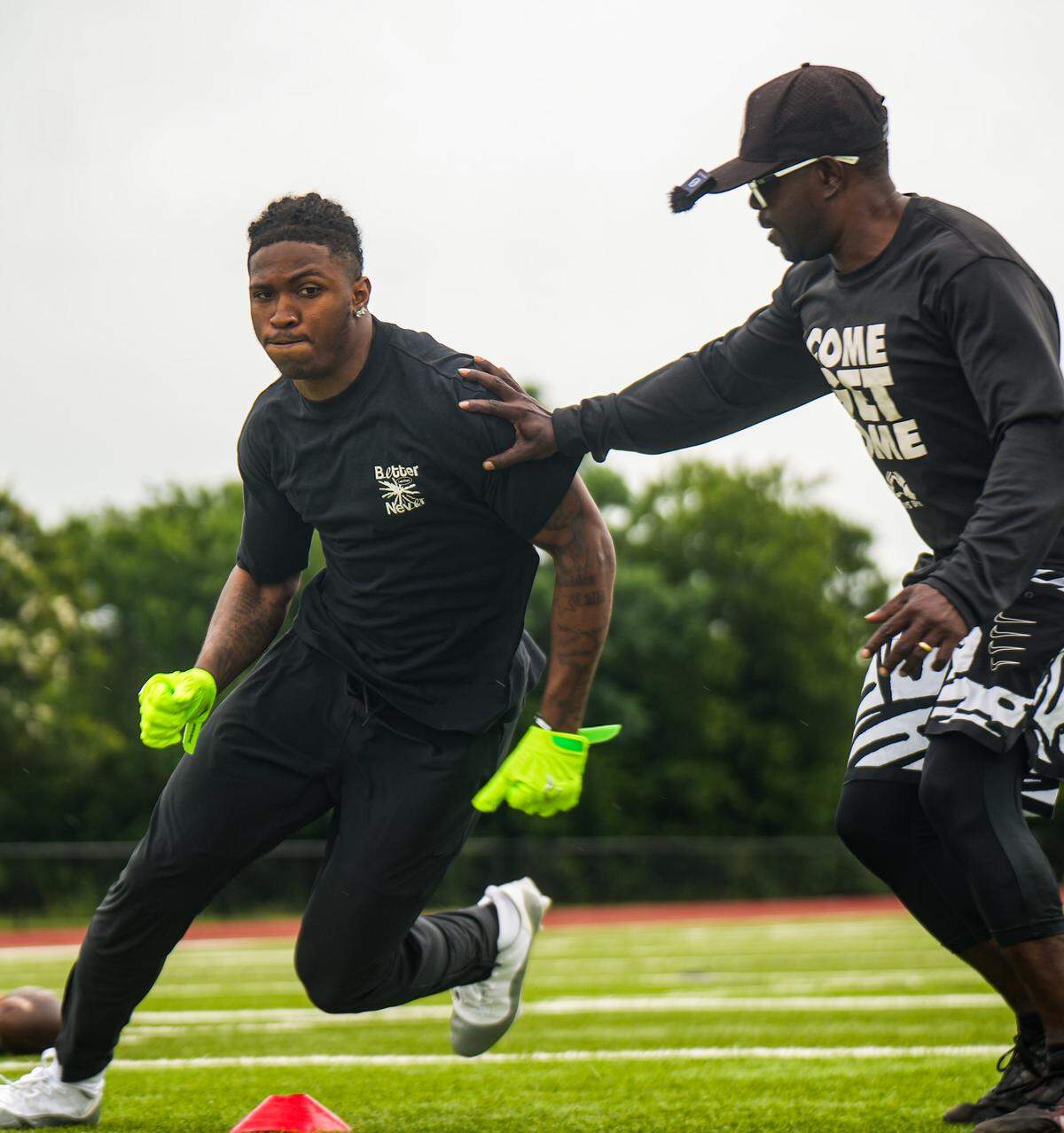 Duncanville product Dakorien Moore (left) trains with David “D-Rob” Robinson (right).