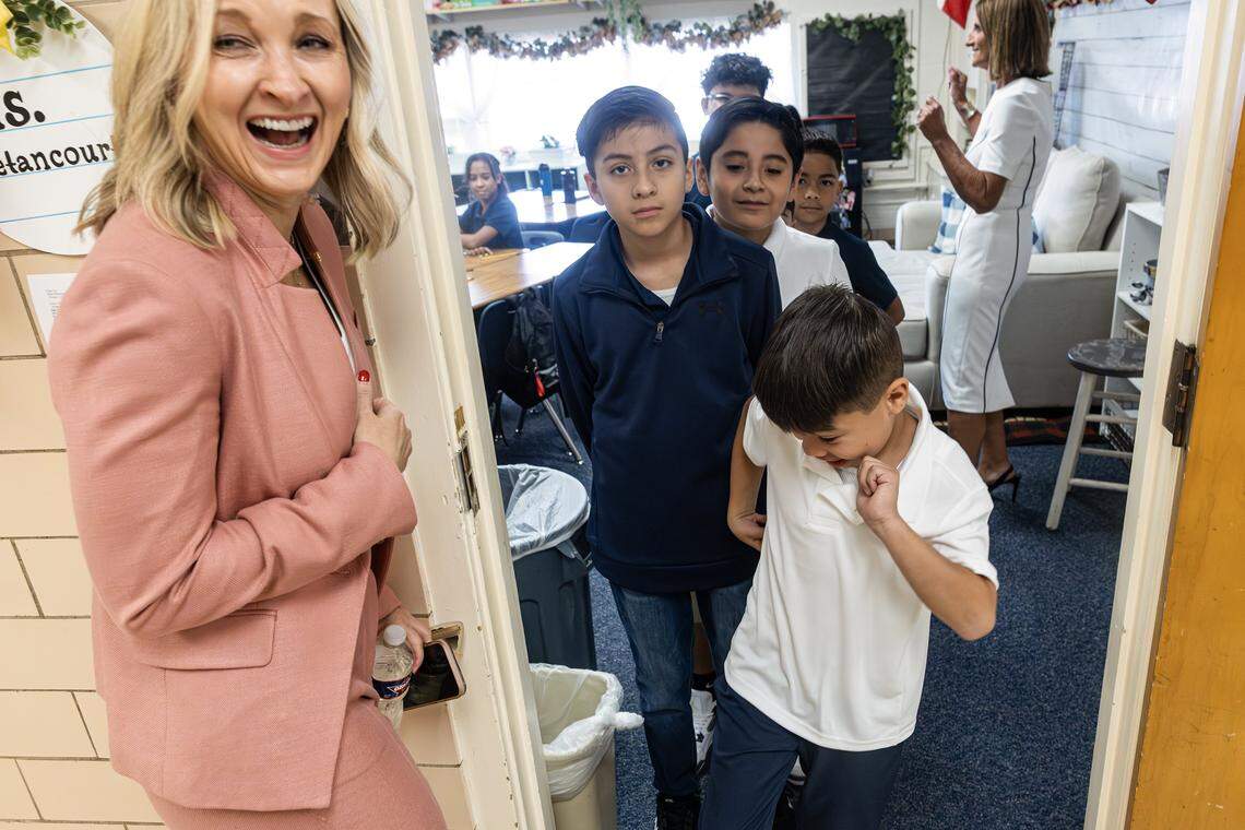 Fort Worth Mayor Mattie Parker reacts to a student dancing on the first day of instruction at Mary Louise Phillips Elementary School in Fort Worth on Tuesday, Aug. 12, 2025.