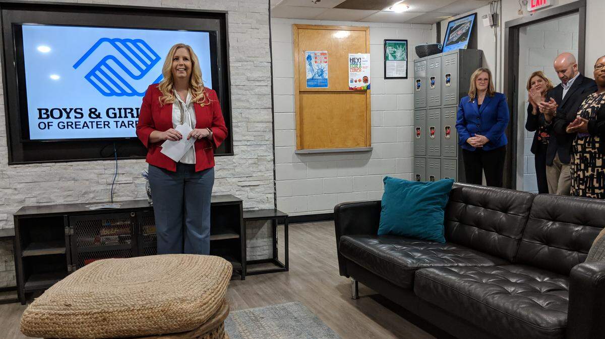Daphne Barlow Stigliano, chief executive officer and president of the new Boys & Girls Club of Greater Tarrant County, speaks Thursday at an event unveiling the new combined club. Stigliano said uniting the Arlington and Fort Worth clubs will mean greater opportunity for Tarrant County kids.