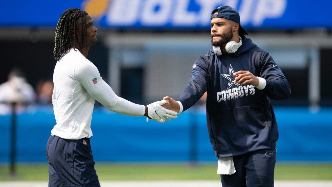 Dallas Cowboys quarterback Dak Prescott, right, declined a spot on the NFC Pro Bowl team. Wide receiver CeeDee Lamb, left, was named to the team as a replacement for Los Angeles Rams receiver Cooper Kupp.
