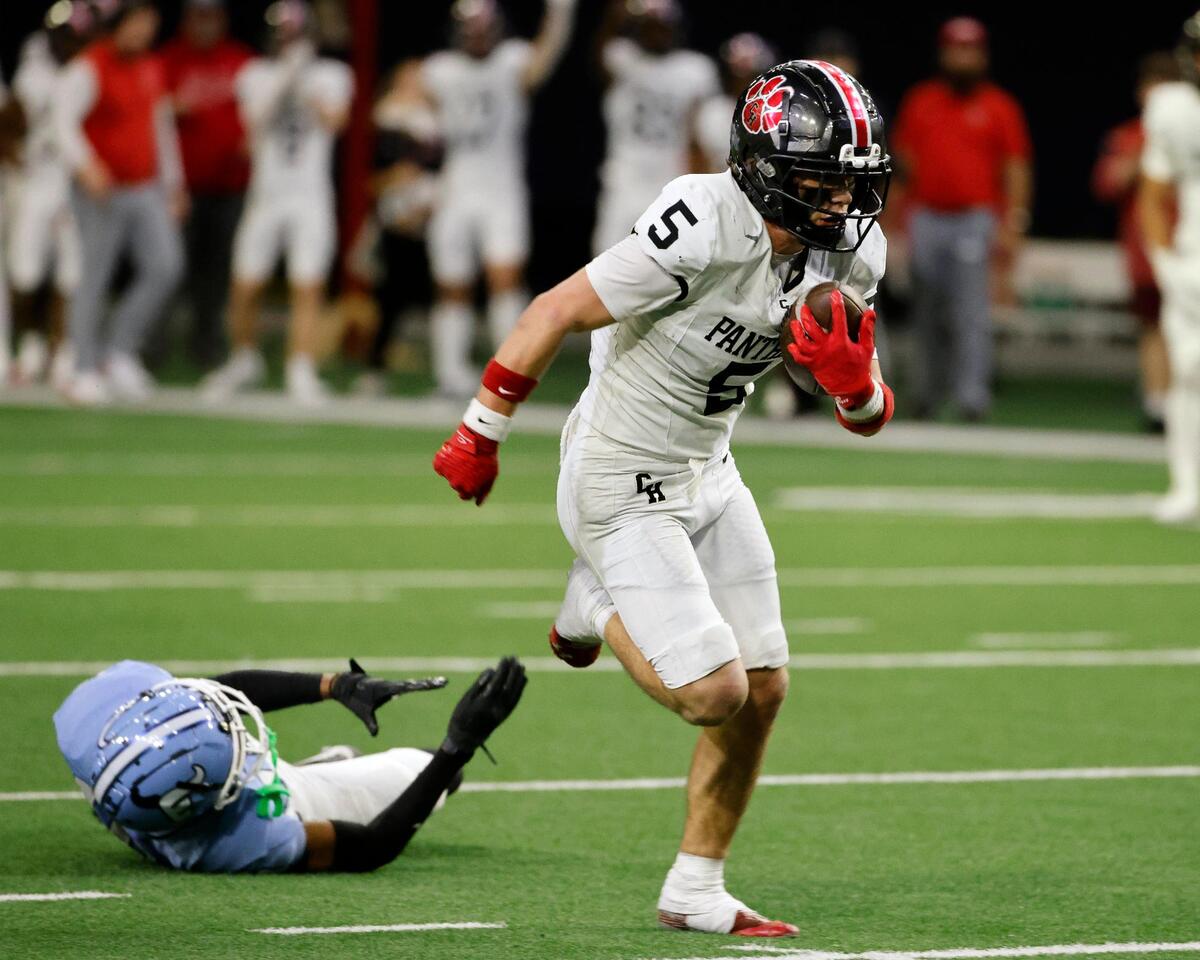 Colleyville Heritage wide receiver Hayden Golden (5) heads to the end zone during the first half of a UIL Conference 5A Division 2 quarterfinal football playoff game at The Ford Center in Frisco, Texas, Friday, Dec. 01, 2023.
