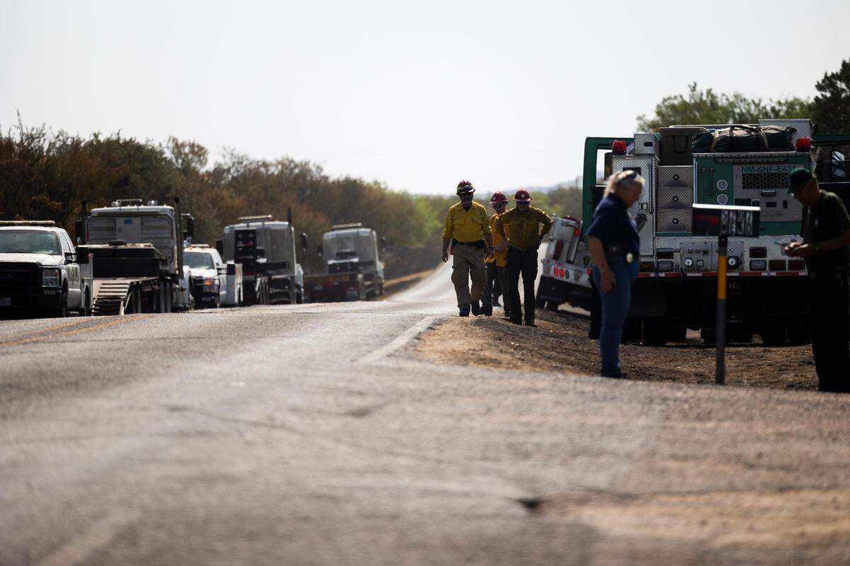 Fire crews fight a wildfire along FM 1148 Tuesday, July 19, 2022, near Possum Kingdom Lake in Graham. The fire had consumed 500 acres and was 10 percent contained.