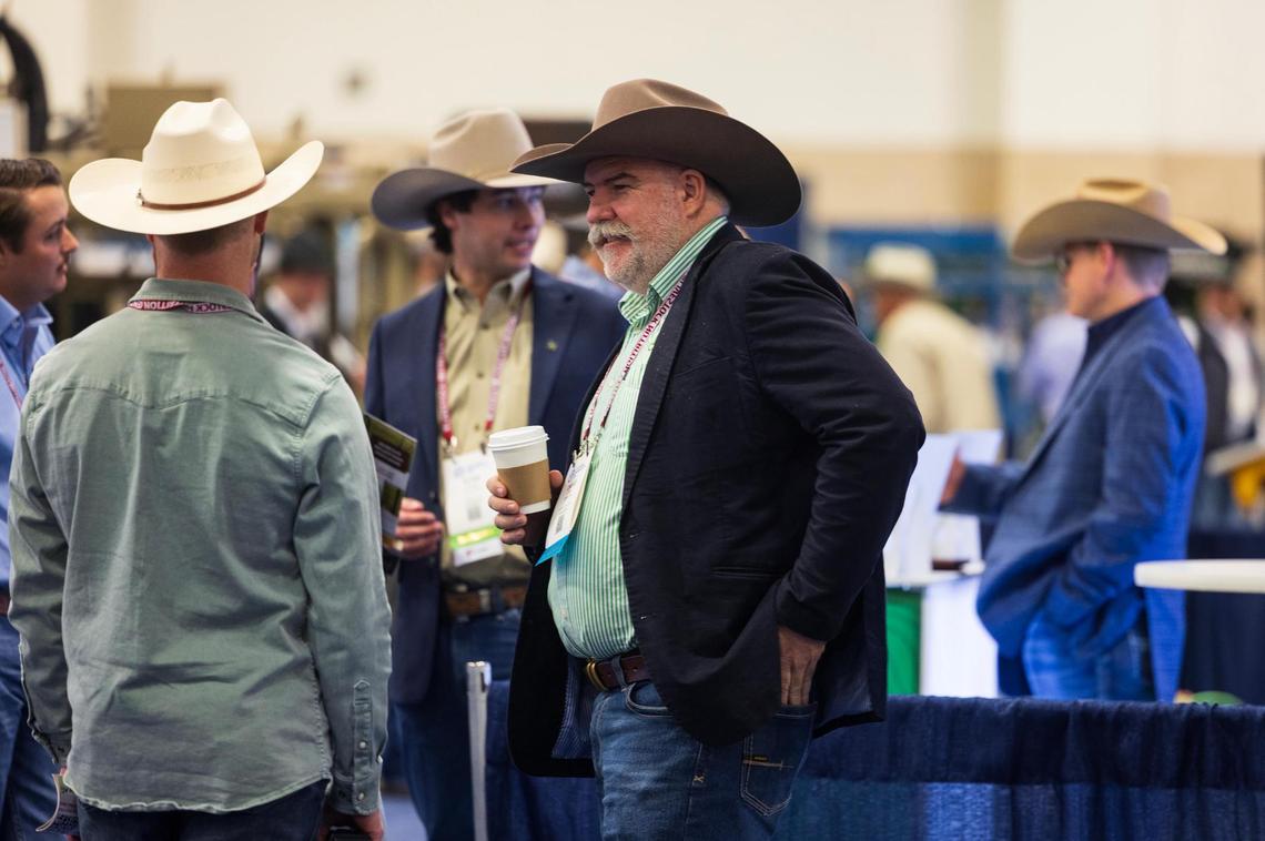 Attendees of the Cattle Raisers Expo and Convention mingle in the exhibit hall on Friday, April 11, 2025, in Fort Worth.