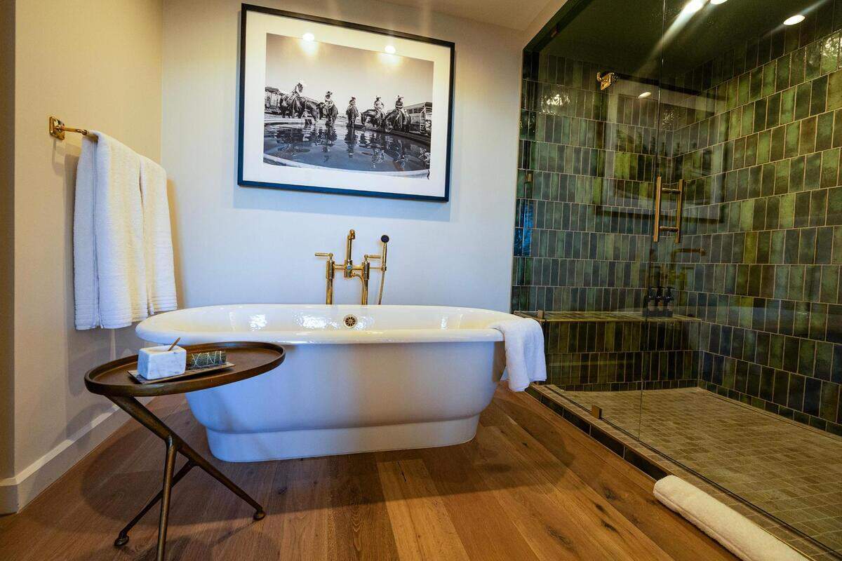 The bathroom in one of the suites on the fourth floor at the new Bowie House hotel in Fort Worth on Tuesday, Nov. 28, 2023.