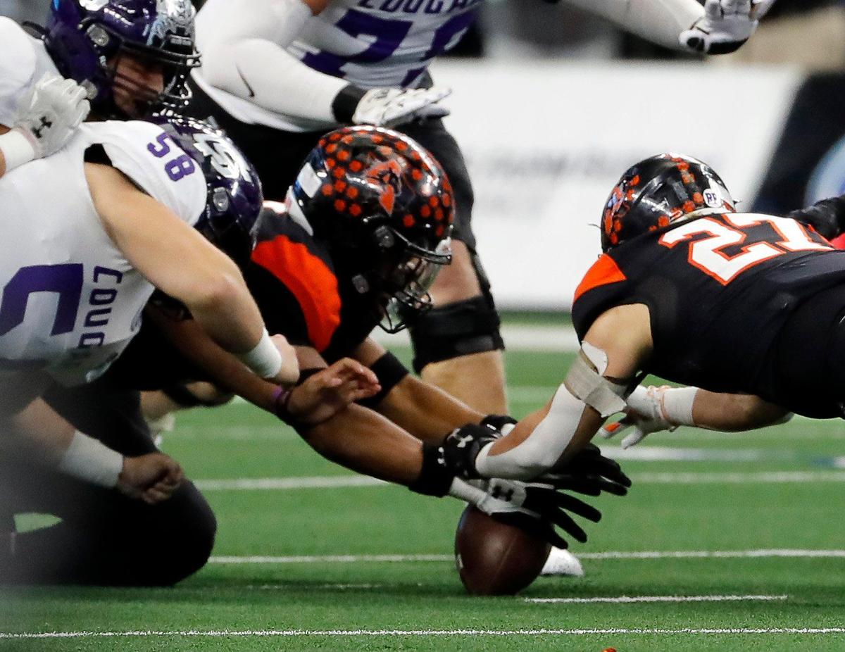 The Bearcats recover a College Station fumble in the first half of a UIL Class 5A D1 state championship football game at AT&T Stadium in Arlington, Texas, Saturday, Dec. 16, 2022. Aledo led 35-0 at the half. (Star-Telegram Bob Booth)