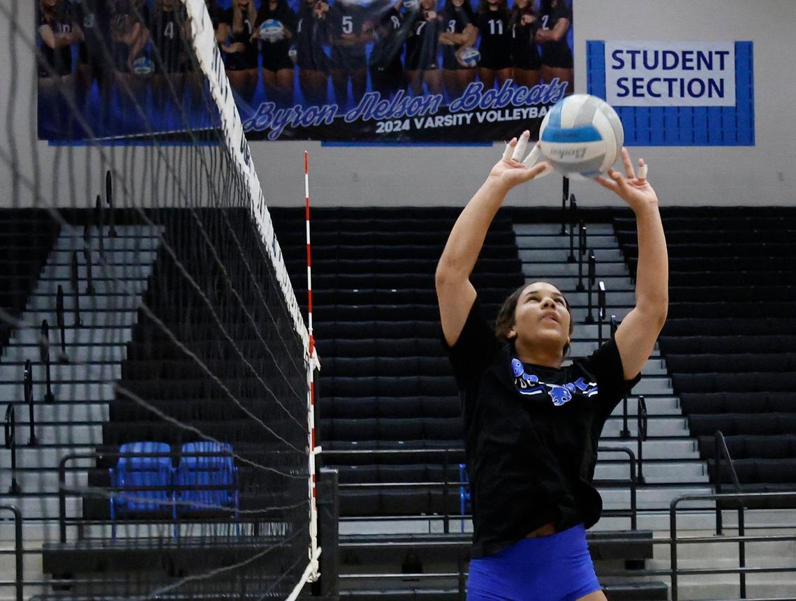 Sophee Peterson sets the ball for a teammate during volleyball practice at Byron Nelson High School in Trophy Club Texas, Wednesday, Sept. 25, 2024.