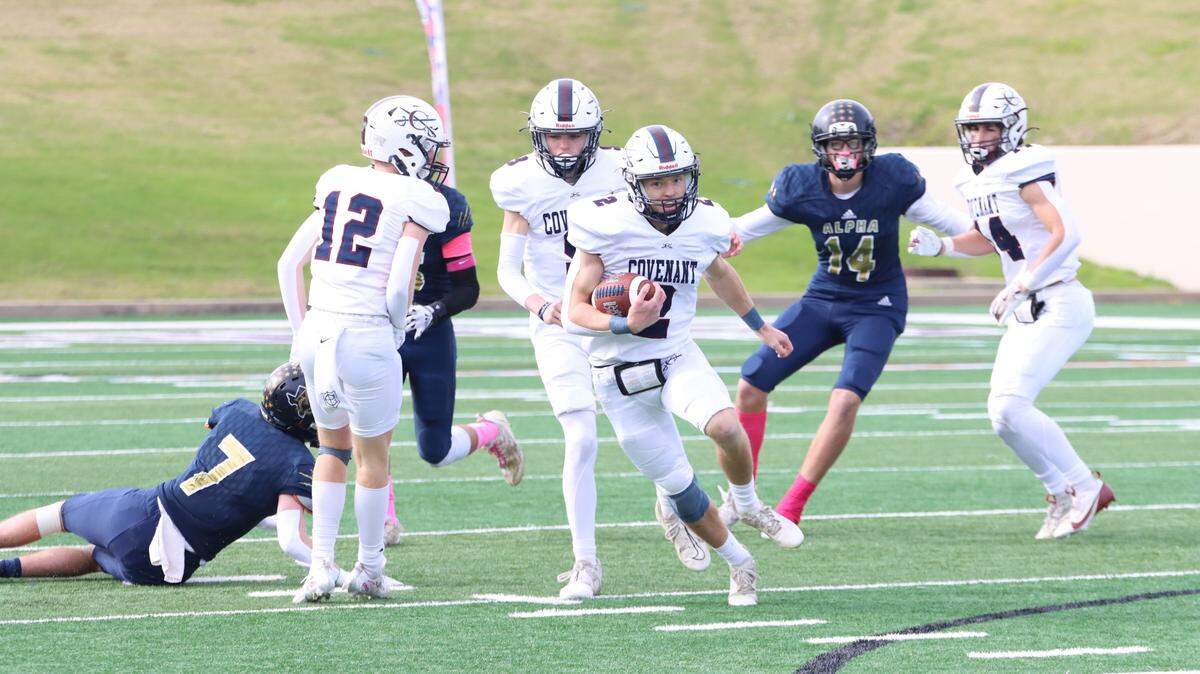 Fort Worth Covenant Classical’s Malachi Brown (2) runs for yardage against Huntsville Alpha Omega in the TAPPS Six-Man Division II Championship game on Thursday, Dec. 5, 2024 at Waco ISD Stadium in Waco, Texas.