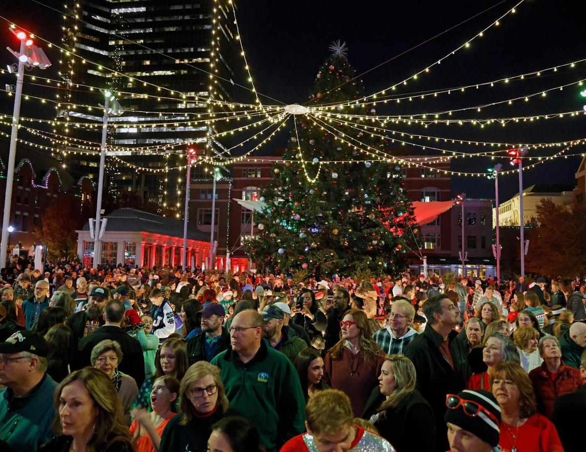 An estimated 8,000 people packed Sundance Sguare plaza Wednesday for the lighting of the community Christmas tree.