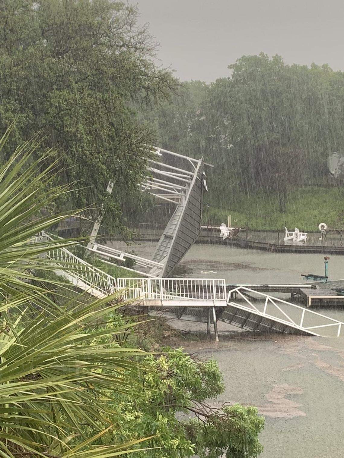 Storms caused damage at Eagle Mountain Lake close to Harbor One Marina in the Dallas-Fort Worth area Tuesday evening.