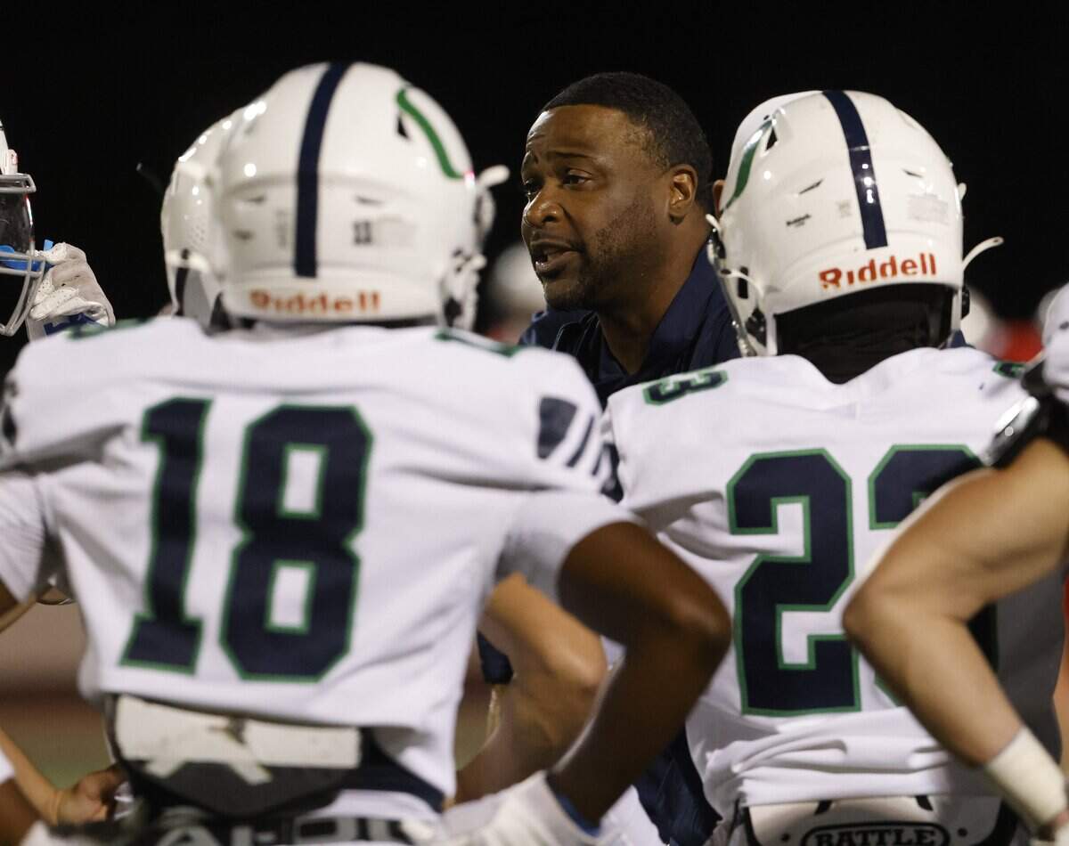 Oakridge head coach Jeromy Flowers talks with the team during a timeout during the first half of the SPC 2025 3A Football Championship football game between The Oakridge School and Fort Worth Country Day at Mavericks Stadium in Arlington, Texas, Saturday Nov. 08, 2025.