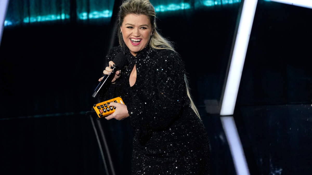 Host Kelly Clarkson speaks at the Billboard Music Awards on Wednesday, Oct. 14, 2020, at the Dolby Theatre in Los Angeles. (AP Photo/Chris Pizzello)
