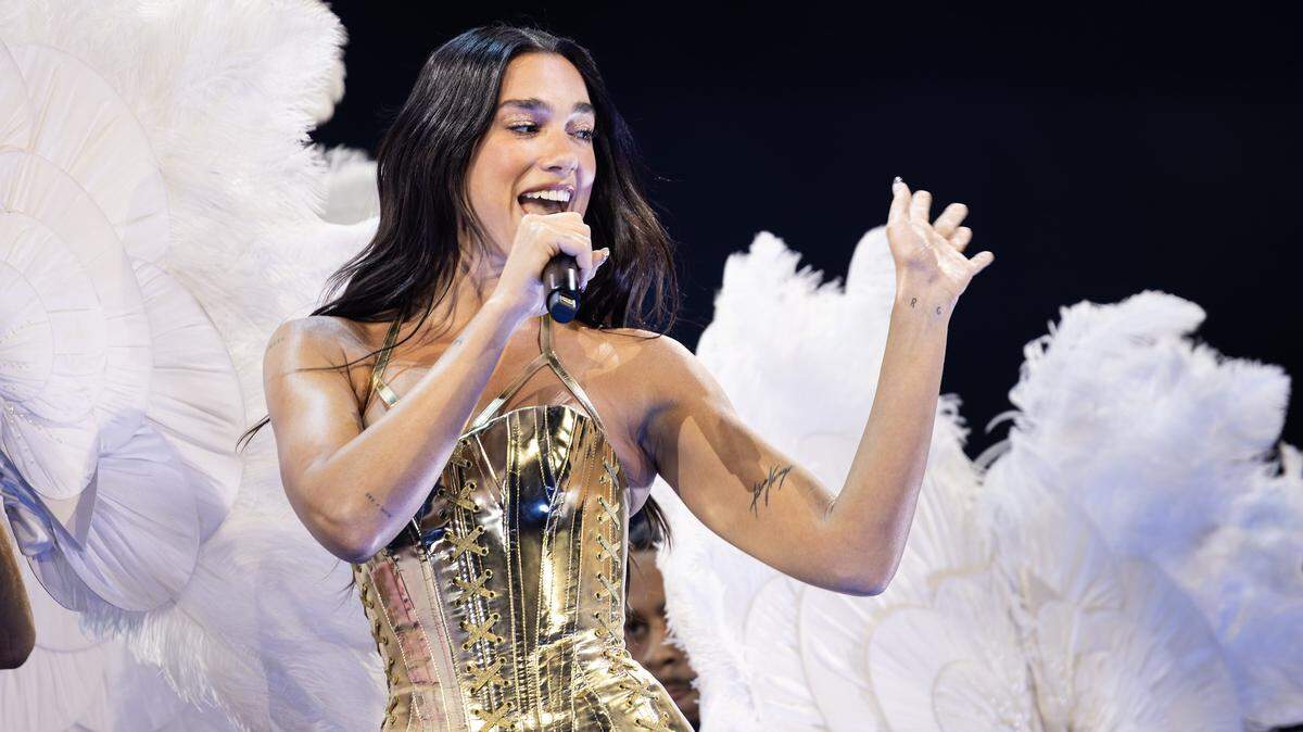 Dua Lipa performs on stage for her Radical Optimism Tour at American Airlines Center in Dallas on Tuesday, Sept. 30, 2025.