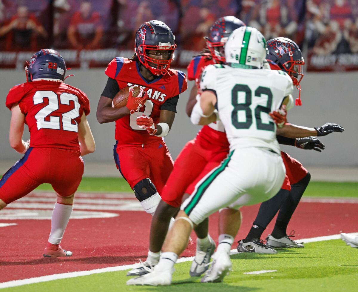 Northwest running back Caris Sela (8) attempts to get out of the end zone after fumbling the kick into the end zone.during a District 4 6A football game at Northwest ISD Stadium in Justin, Texas, Thursday, Oct. 17, 2024. The kick was replayed due to offsetting penalties.