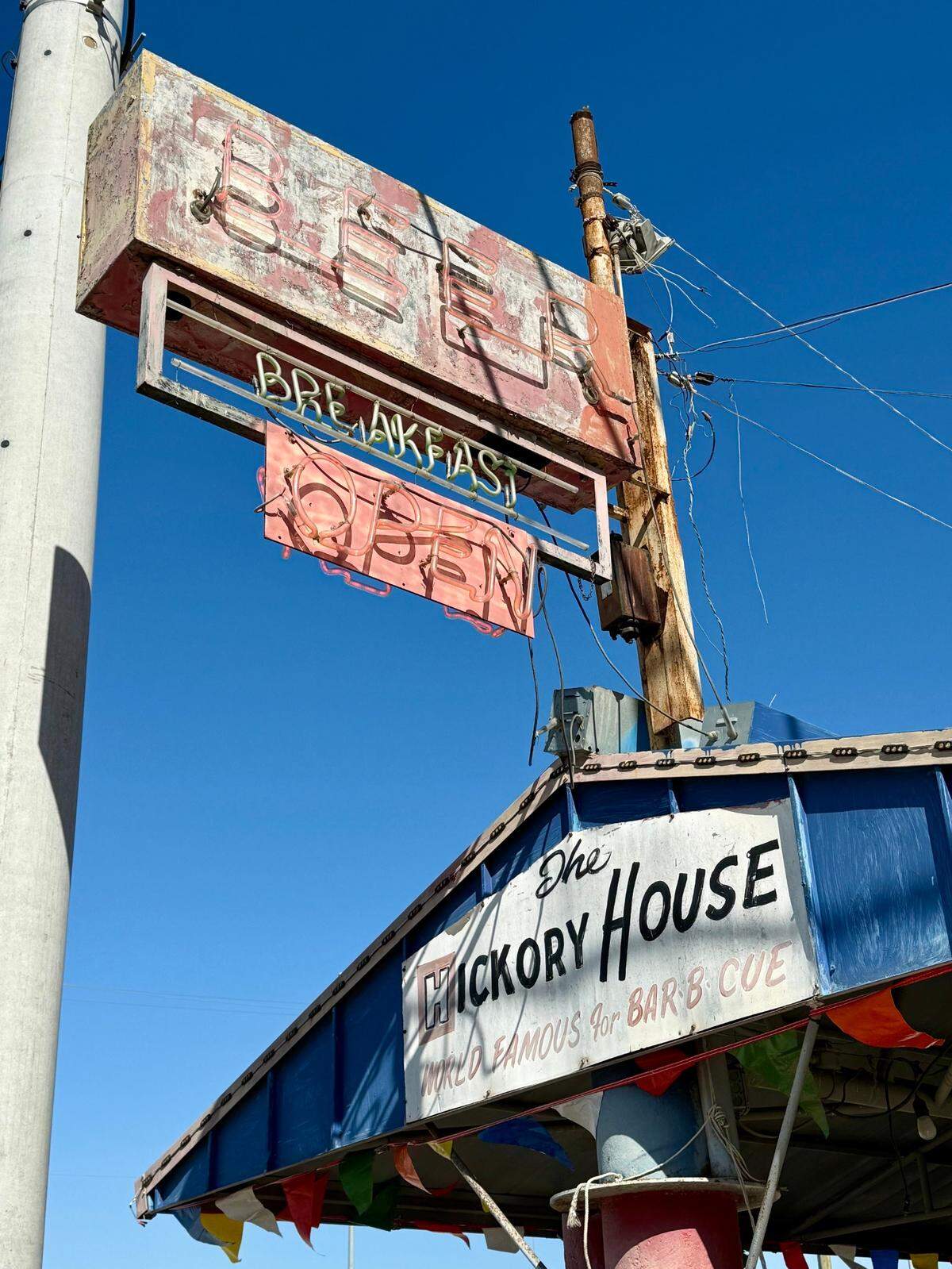 Hickory House BBQ and Grill’s signs have stood for 72 years alongside South Riverfront Boulevard. the old U.S. 77.