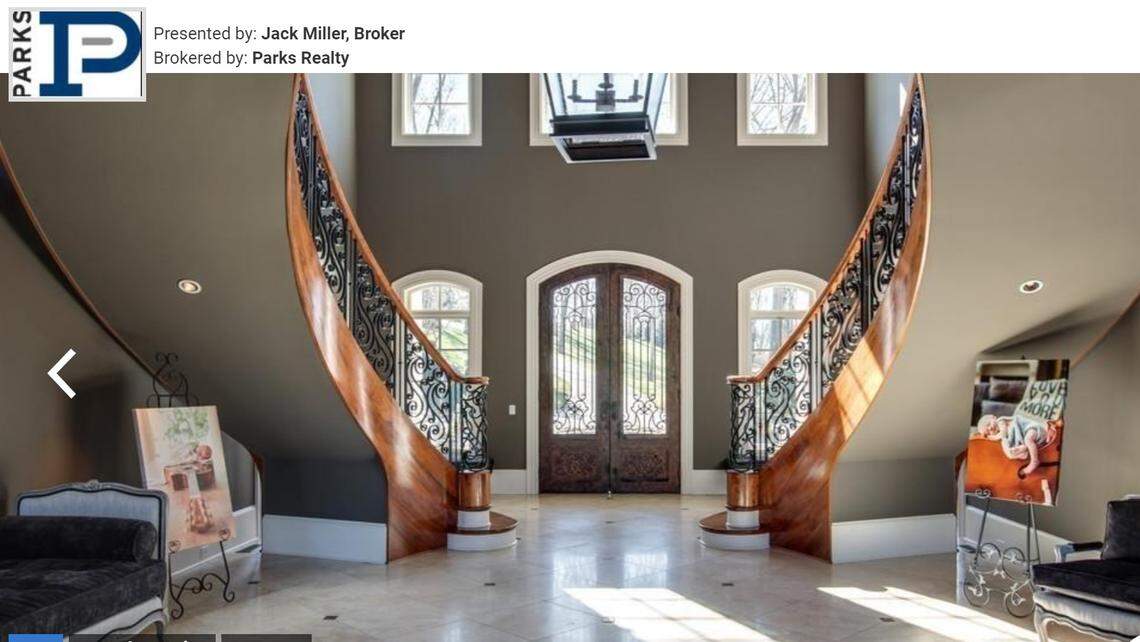 Foyer with dual staircases