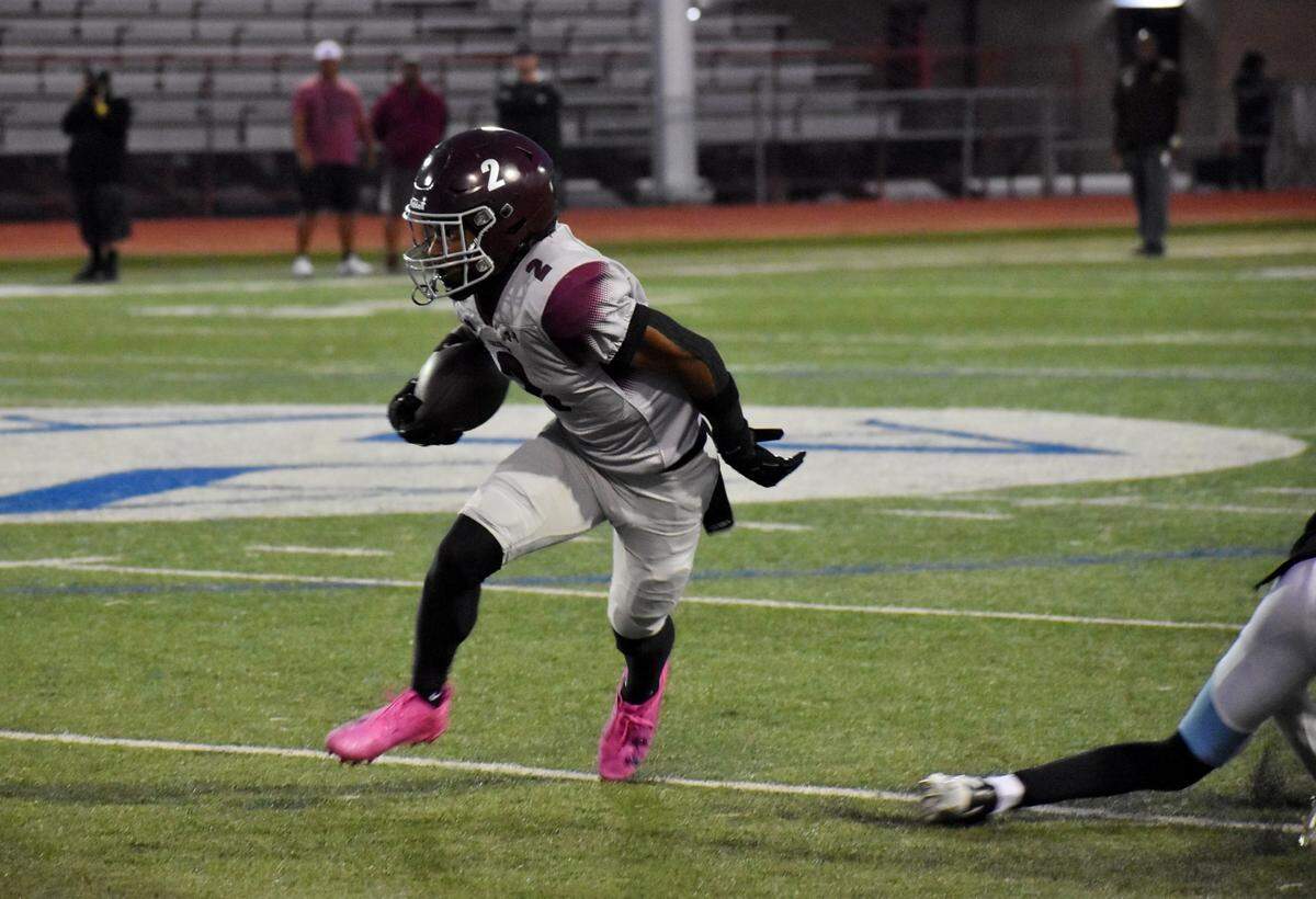 Mansfield Timberview wide receiver Tyler Madison makes a move after a catch against Arlington Seguin during a UIL football game at C.H. Wilemon Field in Arlington on Thursday, Oct. 3, 2024.