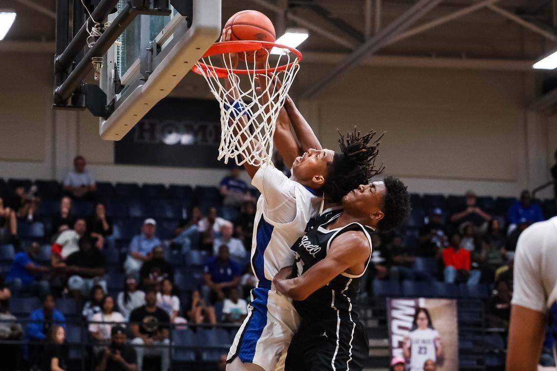 North Crowley guard Jonathan Fox (21) dunks on a Coppell defender in the UIL 6A D1 regional semifinal at Timberview High School in Arlington, Texas, Tuesday, March 3, 2026.
