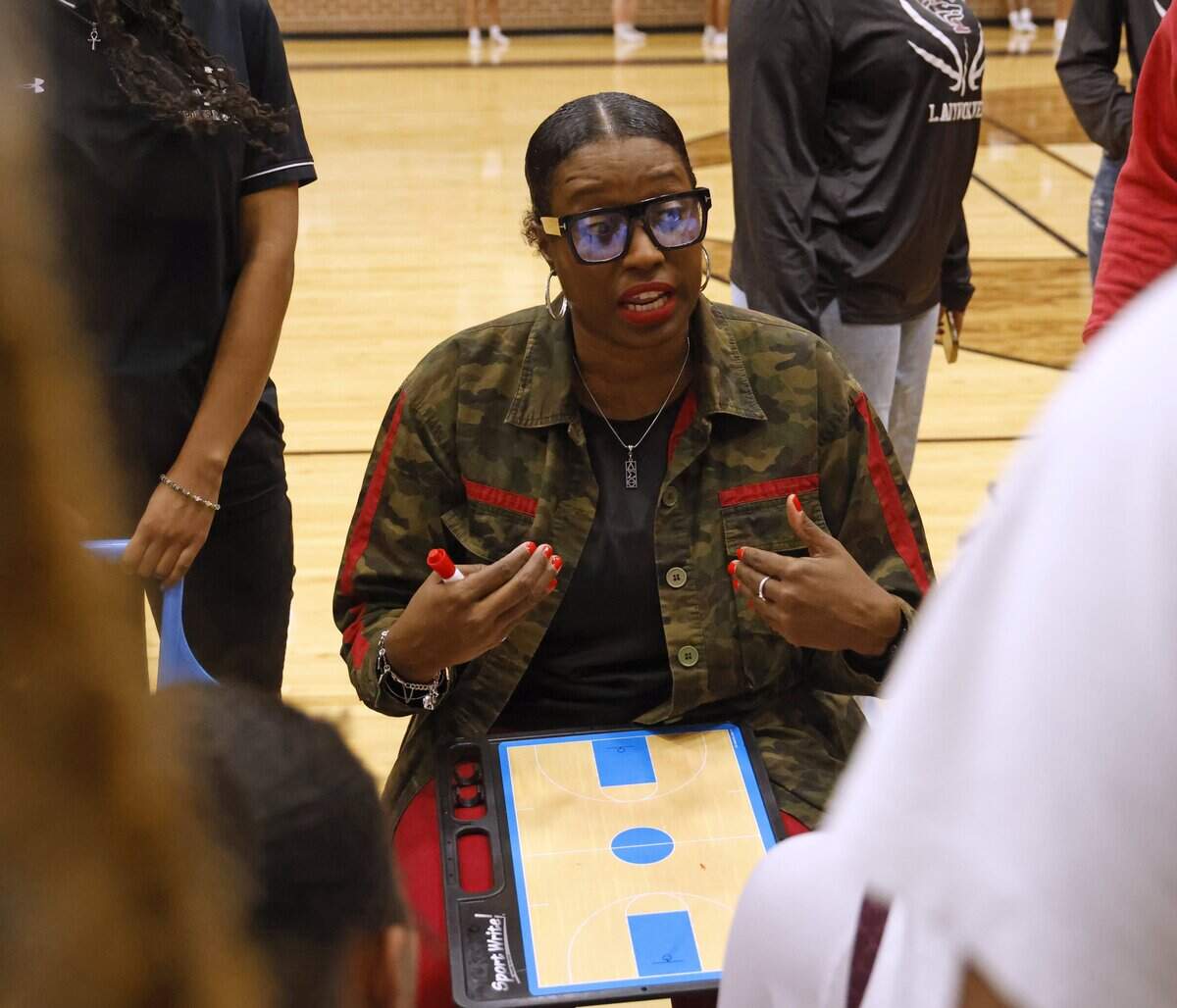 Mansfield Timberview head coach LaQueisha Dickerson talks to the team during the first half of a UIL girls basketball game against Mansfield Summit at Mansfield Timberview High School in Arlington, Texas, Tuesday Feb. 10, 2026.