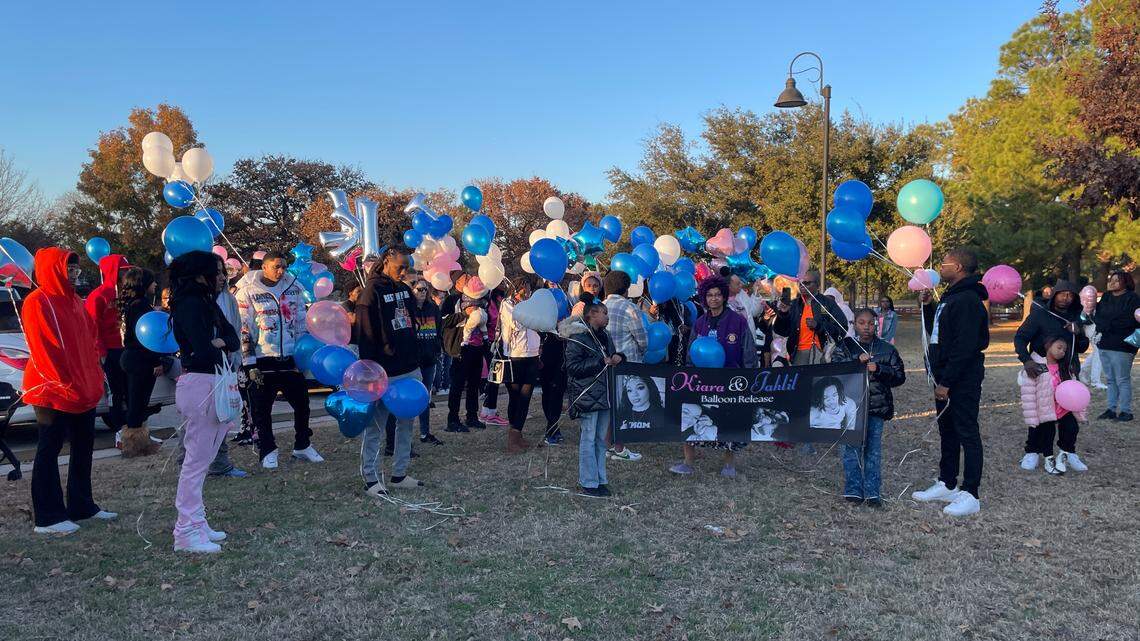 Family and friends of Kiara Valdez and Jahlil Kirkland gather for a balloon release Saturday, Dec. 21, 2024, at S.J. Stovall Park in Arlington. 