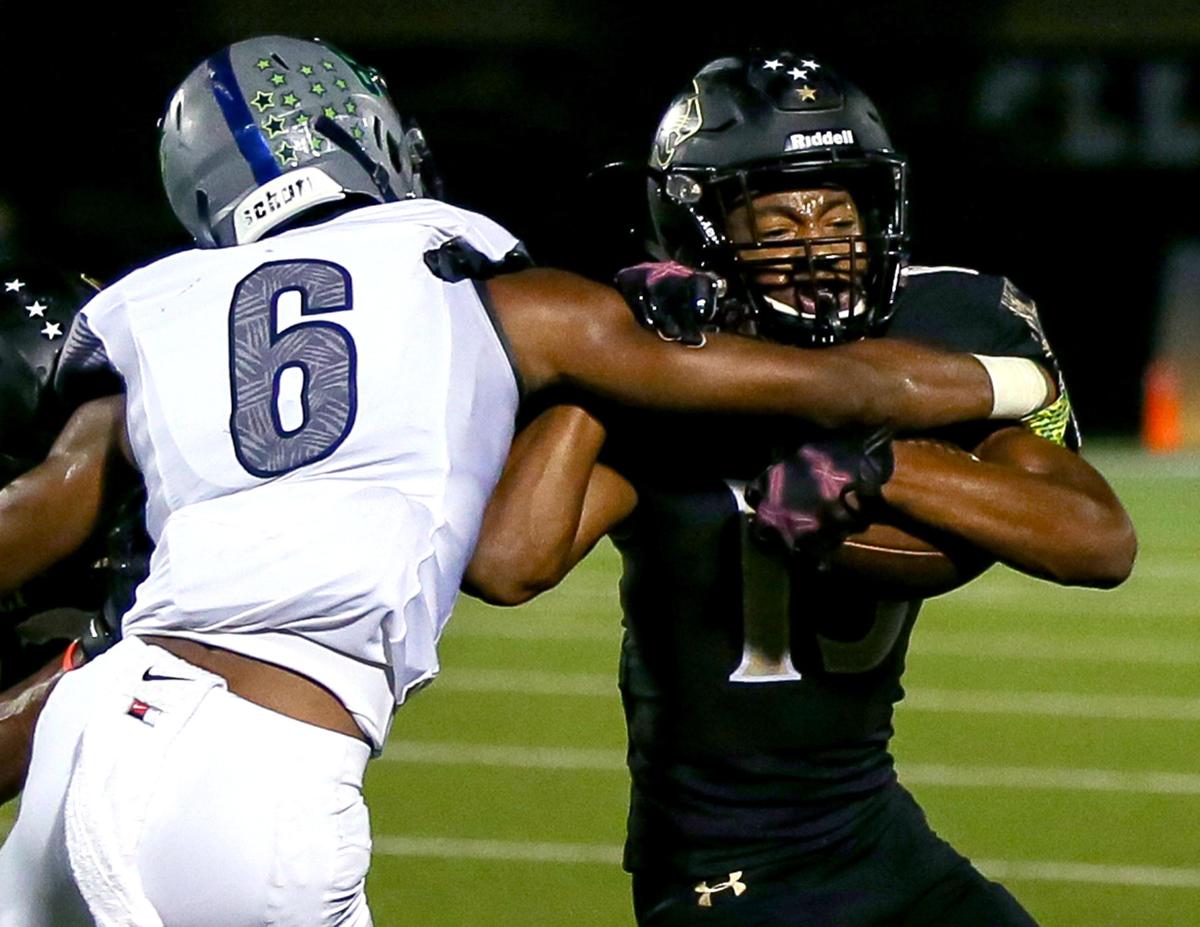 Keller Fossil Ridge wide receiver Daniel Cobbs gets stopped for no gain by Eaton cornerback Gideon Filer (6) during the second half, Thursday night, October 3 2019 played at the Keller ISD Sports Complex in Keller, TX.